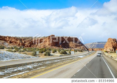 Mountain with snow-covered rocks along I-40 highway in New Mexico Mountain with snow-covered rocks along I-40 highway in New Mexico 85354966