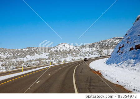 Panorama view of snowy mountain desert after the snowstorm in Arizona winter with of Interstate I-17 85354978