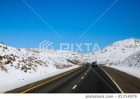 Freshly fallen snow Interstate 17 road in Arizona desert after the snowstorm Freshly fallen snow Interstate 17 road in Arizona desert after the snowstorm 85354979