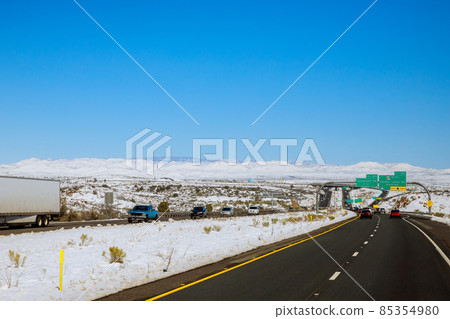 View of the I-17 Interchange valley landscape in winter with snow, Arizona USA View of the I-17 Interchange valley landscape in winter with snow, Arizona USA 85354980