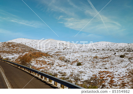 Snowy mountain panorama view in Arizona winter with snow clear blue sky Snowy mountain panorama view in Arizona winter with snow clear blue sky 85354982