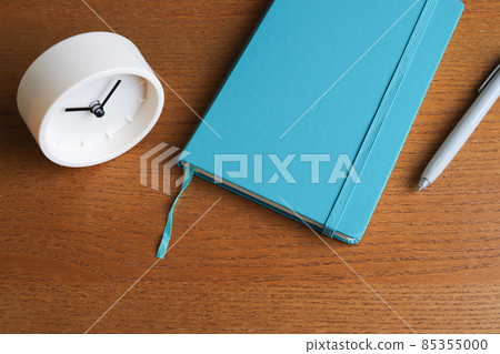 Clock and notebook business image Clock and notebook business image 85355000
