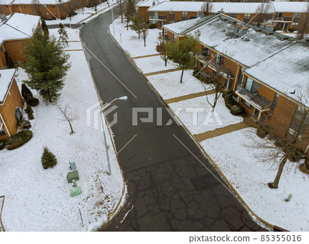 Snowy winter day on the in snow covered road 85355016