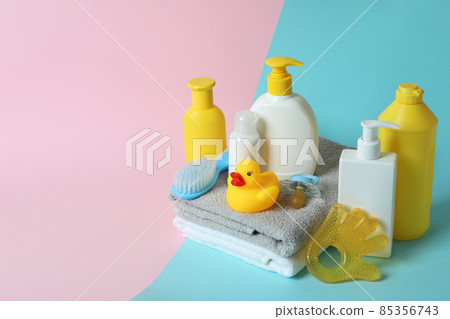 Different baby hygiene accessories on two tone background Different baby hygiene accessories on two tone background 85356743