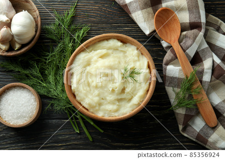 Concept of tasty eating with mashed potatoes on wooden table 85356924