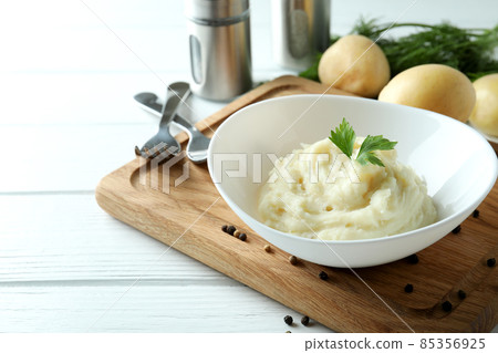 Concept of tasty eating with mashed potatoes on white wooden table 85356925