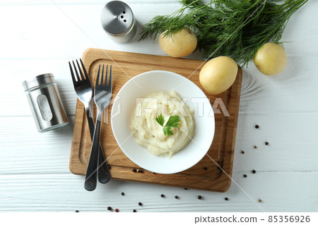 Concept of tasty eating with mashed potatoes on white wooden table 85356926