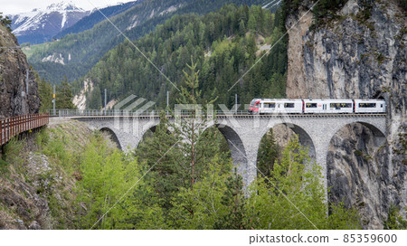 Glacier train on landwasser Viaduct bridge, Switzerland 85359600