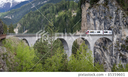 Glacier train on landwasser Viaduct bridge, Switzerland Glacier train on landwasser Viaduct bridge, Switzerland 85359601