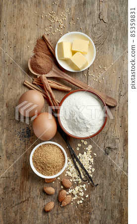baking ingredients on wooden table baking ingredients on wooden table 85359831