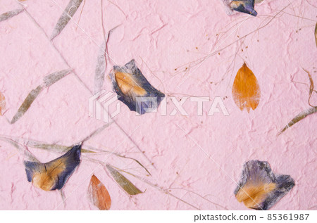 mulberry paper with red and yellow flower petal and seed texture background. 85361987