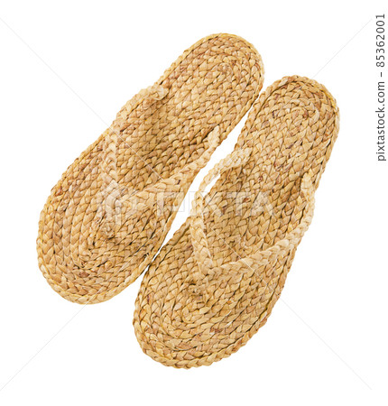 Flip flop made from Water hyacinth or Floating water hyacinth isolated on white background. The Green product eco friendly concept. Flip flop made from Water hyacinth or Floating water hyacinth isolated on white background. The Green product eco friendly concept. 85362001