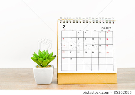 The february 2022 desk calendar with plant pot. 85362095
