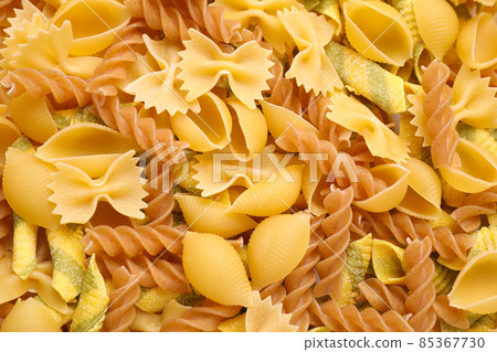 Different types of pasta as background, top view Different types of pasta as background, top view 85367730
