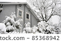 Snowcovered country house light grey blue color 85368942