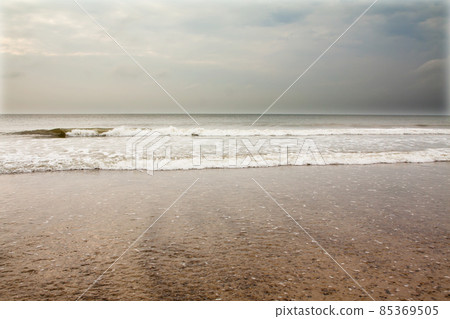 North Sea beach in Denmark at cloudy day. North Sea beach in Denmark at cloudy day. 85369505