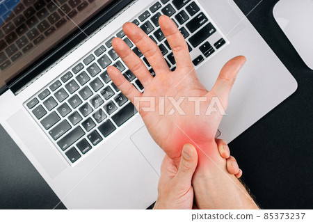 Carpal tunnel syndrome. Hand pain in man injury wrist. Arthritis office syndrome is consequence of computer. Health care and medical concept. 85373237