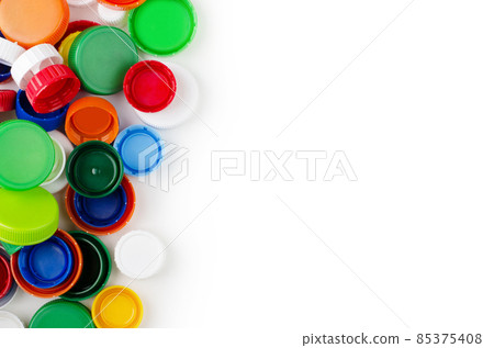 Group of multicolored bottle caps isolated Group of multicolored bottle caps isolated 85375408