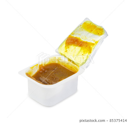 Dip sauce in a plastic take away container isolated Dip sauce in a plastic take away container isolated 85375414