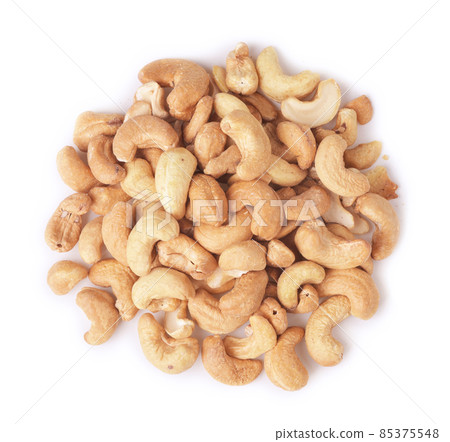 Heap of cashew nuts isolated Heap of cashew nuts isolated 85375548