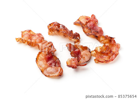 Cooked fried slices of bacon isolated 85375654