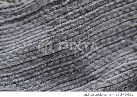 Organic waffle linen towels, bamboo toothbrushes, bathroom zero waste accessories in grey shades in contemporary bathroom interior. Daily body care, spa and wellness zero waste bathroom concept 85376432