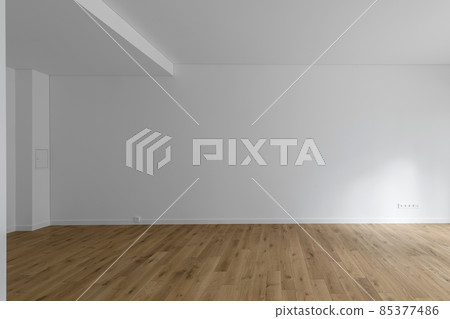 Empty minimalist modern room with white walls and oak wood floor Empty minimalist modern room with white walls and oak wood floor 85377486