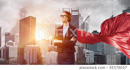 Concept of power and sucess with businesswoman superhero in big city 85378037