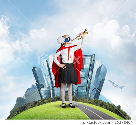 Girl power concept with cute kid guardian against cityscape background 85378404