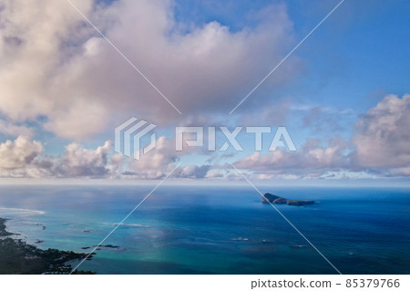 Aerial picture of the north, north east coast of Mauritius Island. Beautiful lagoon of Mauritius Island shot from above. 85379766