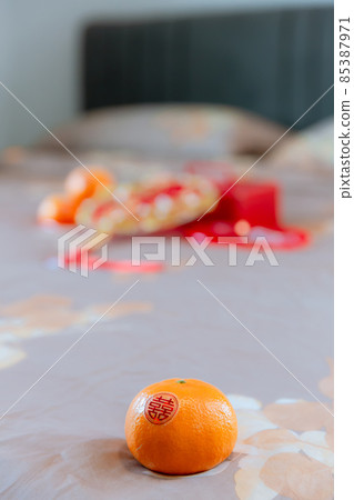 Chinese wedding ceremony. Orange Chinese Text are attached. 85387971