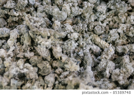 Close up: renewable resource - heap of secondary soft plastic granules Close up: renewable resource - heap of secondary soft plastic granules 85389748