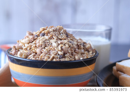 muesli chocolate flavor cereal breakfast in bowl muesli chocolate flavor cereal breakfast in bowl 85391973