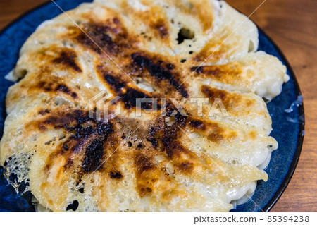 Home-cooked grilled dumplings close-up Home-cooked grilled dumplings close-up 85394238