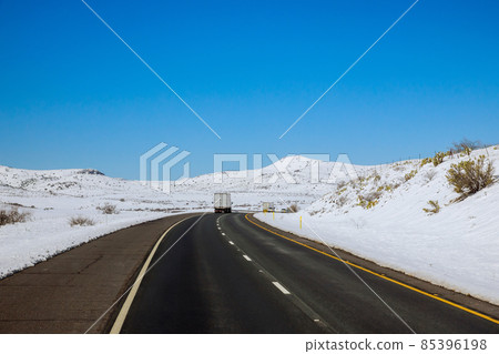 Freshly fallen snow Interstate 17 road in Arizona desert after the snowstorm Freshly fallen snow Interstate 17 road in Arizona desert after the snowstorm 85396198