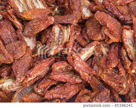 Organic sun dried red tomatoes displayed for sale in  a country fair 85396241
