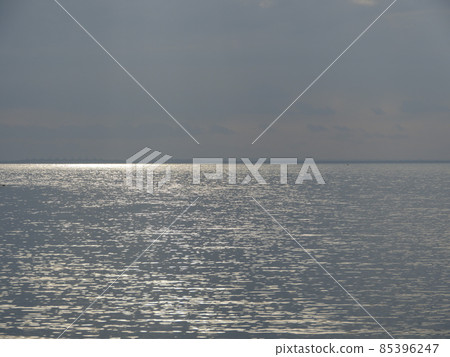 sea is lit by the rays of the setting sea is lit by the rays of the setting 85396247