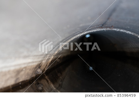 water surface level view from inside a concrete culvert 85396459