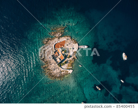 Boats stand near the island of Otocic Gospa. Montenegro. Drone Boats stand near the island of Otocic Gospa. Montenegro. Drone 85400455