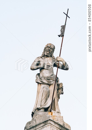 Sculpture of a man with a cross on the Church of Saint apostle Mark. Montenegro Sculpture of a man with a cross on the Church of Saint apostle Mark. Montenegro 85400508