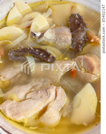 Chinese home-cooked chicken and seafood soup with bamboo shoots 85402147