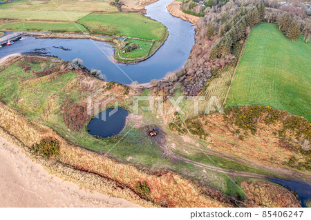 Aerial view of the historic church and graveyardof Inver in County Donegal - Ireland. Aerial view of the historic church and graveyardof Inver in County Donegal - Ireland. 85406247