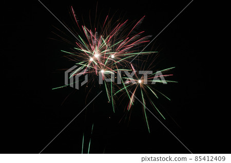 Beautiful colorful holiday fireworks on the black sky. Beautiful colorful holiday fireworks on the black sky. 85412409