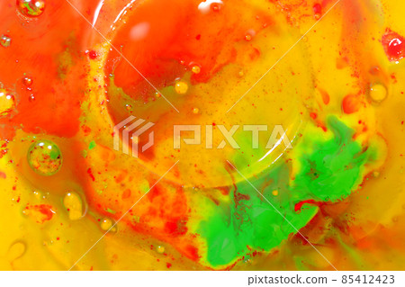 Bright oily transparent bubbles on a yellow-pink background. Bright oily transparent bubbles on a yellow-pink background. 85412423