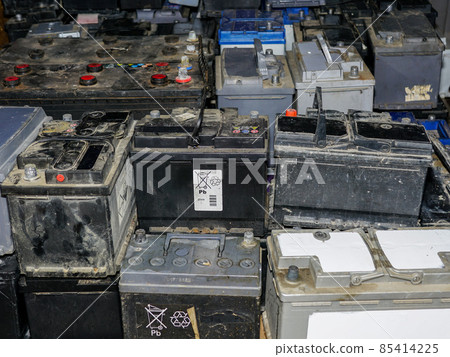 Pallet with many used car batteries for recycling 85414225