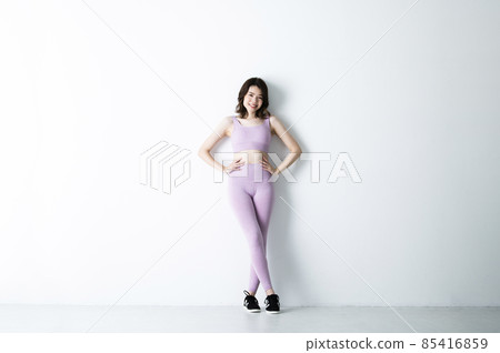 Women's sports training portrait smile looking at the camera Women's sports training portrait smile looking at the camera 85416859