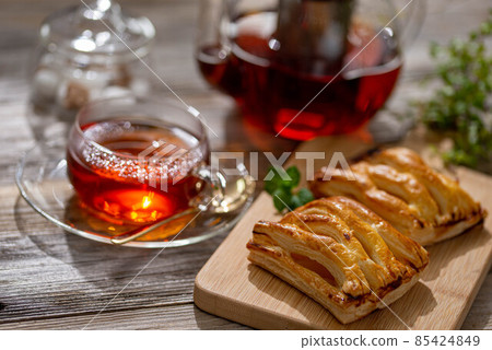 Have a homemade apple pie with tea Have a homemade apple pie with tea 85424849