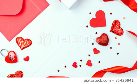 Valentines day heart. Red heart, romantic gift on love white with copy space. Valentine decoration for flat lay background. Valentines day heart. Red heart, romantic gift on love white with copy space. Valentine decoration for flat lay background. 85426941