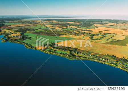 Lyepyel District, Vitebsk Region, Belarus. Aerial View Of Residential Area With Houses In Countryside. Morning Fog Above Lepel Lake And Town Skyline. Bird's Eye View Lyepyel District, Vitebsk Region, Belarus. Aerial View Of Residential Area With Houses In Countryside. Morning Fog Above Lepel Lake And Town Skyline. Bird's Eye View 85427193