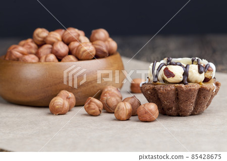 chocolate cake with nougat and roasted hazelnuts 85428675